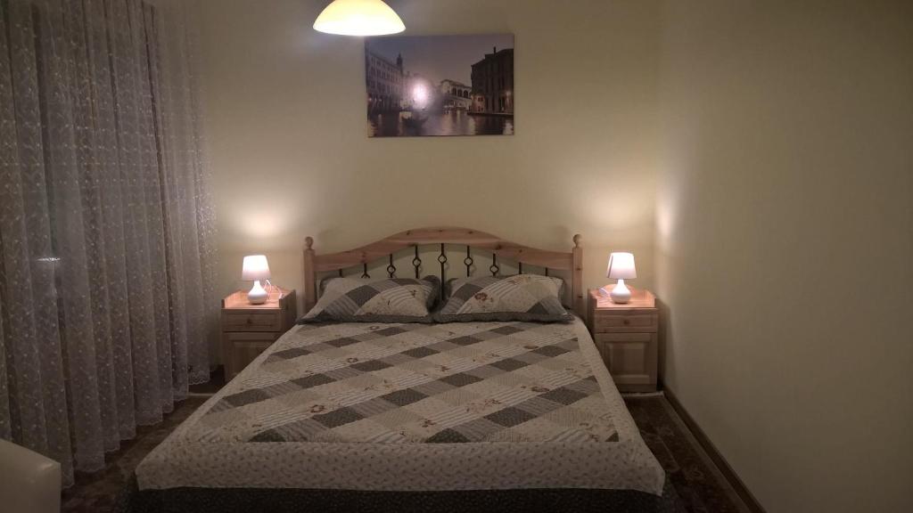 Postel nebo postele na pokoji v ubytování Pongrácz Apartman