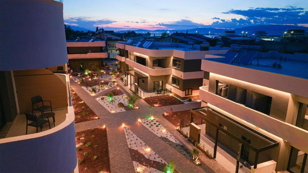 an aerial view of a building at night at Sunset Premium in Keramoti