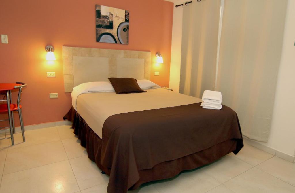 Postel nebo postele na pokoji v ubytování Dreams Hotel Puerto Rico