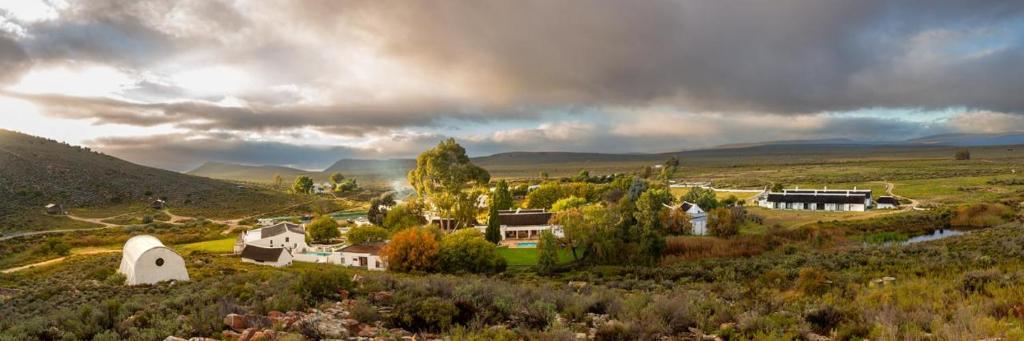 a small village in the middle of a field at Karoo 1 Hotel Village in De Doorns