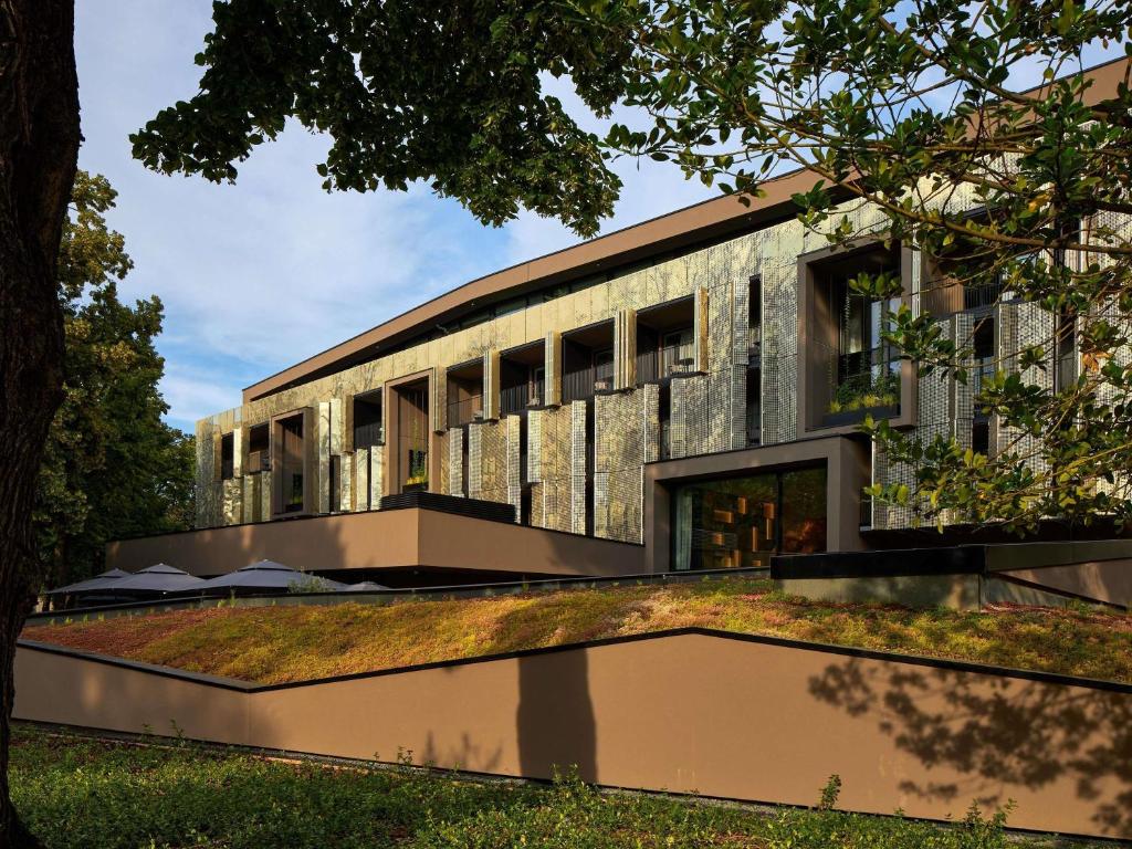 an external view of the building at L'Esquisse Hotel & Spa Colmar - MGallery Collection in Colmar