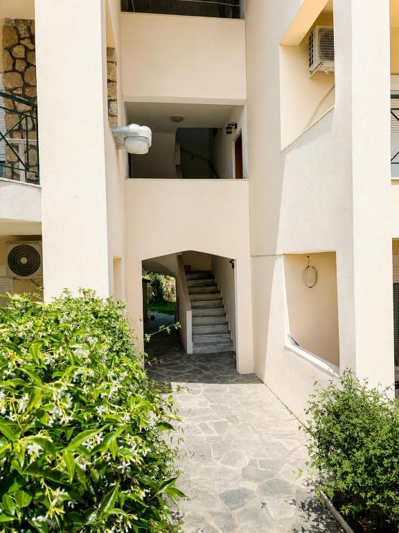 a stairway leading up to a building at KallitheaDeluxe in Kallithea Halkidikis