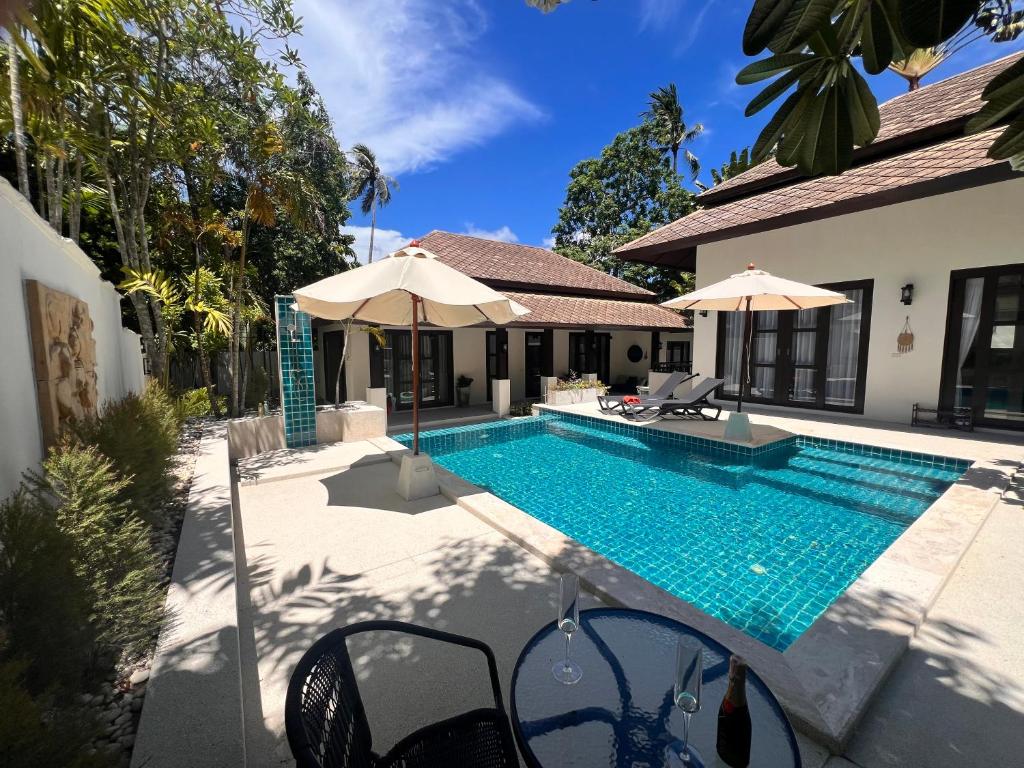 an image of a swimming pool in a house at Villa Mirada Maenam - Renovated Four Bedroom with Private Pool in Nathon Bay