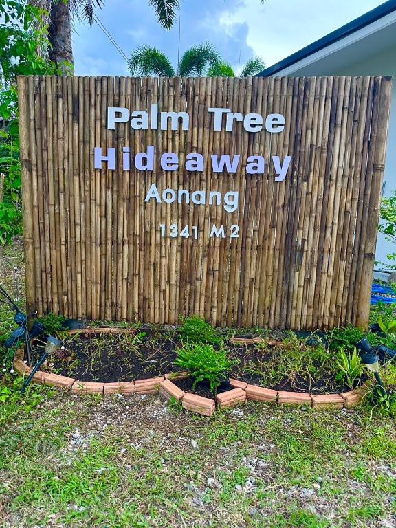 a sign for a rain tree highay anywhere at Palm Tree Hideaway in Ao Nang Beach