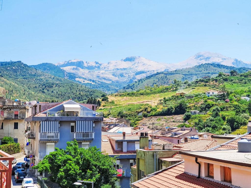 a view of a city with mountains in the background at Holiday Home SinAgo by Interhome in Lascari