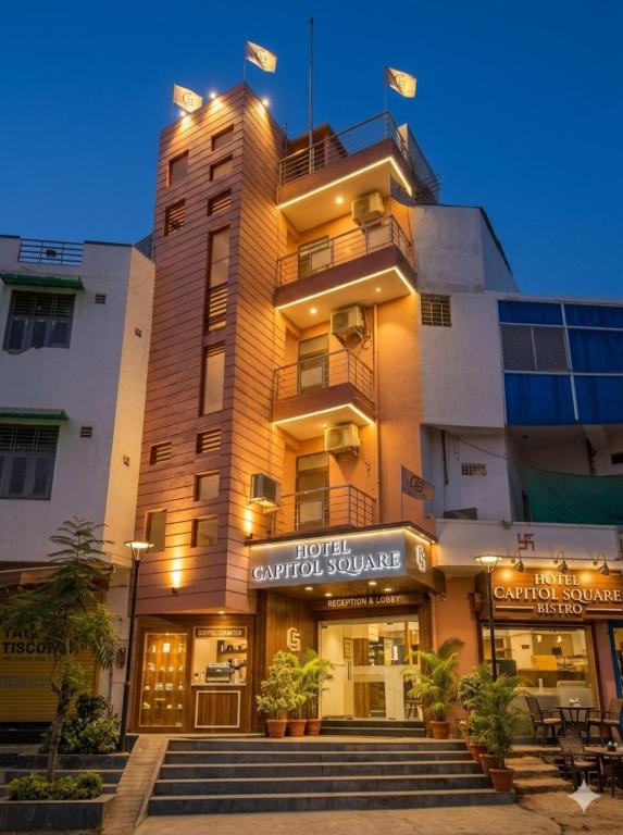 a hotel convention square with stairs in front of it at Capitol Square Near Railway Station in Jaipur