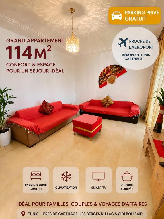a living room with red couches and avertisement for at emplacement exceptionnel in Tunis