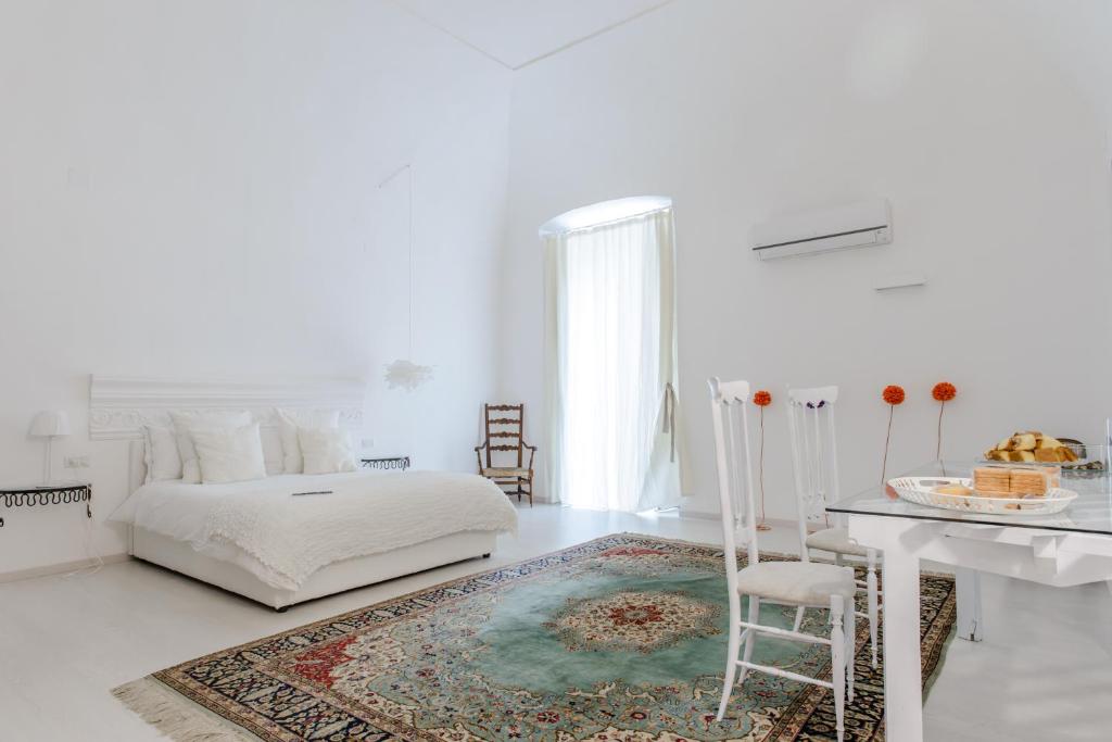 Cama o camas de una habitación en Palazzo Venusio