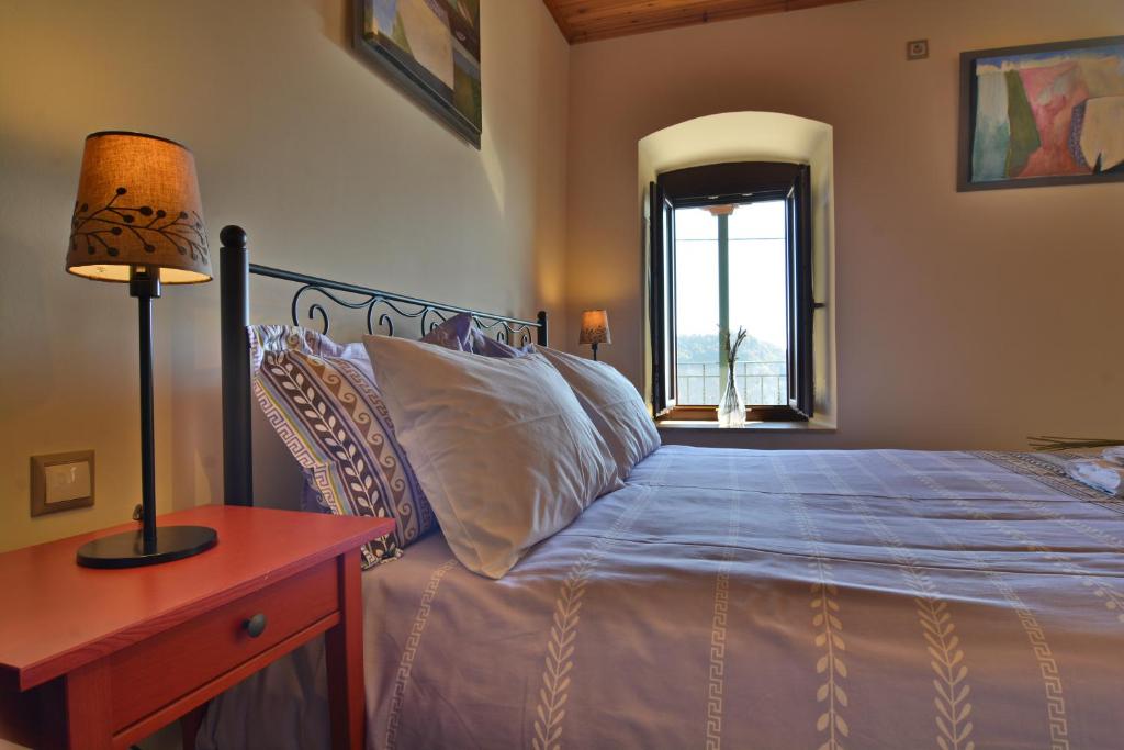Postel nebo postele na pokoji v ubytování Gartagani Guest House