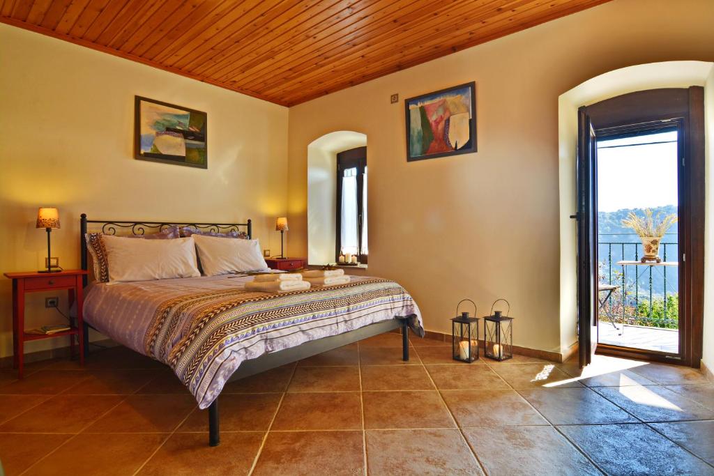 Postel nebo postele na pokoji v ubytování Gartagani Guest House