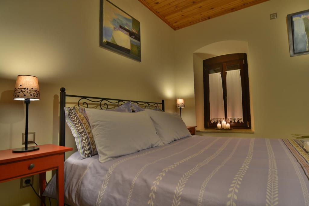 Postel nebo postele na pokoji v ubytování Gartagani Guest House