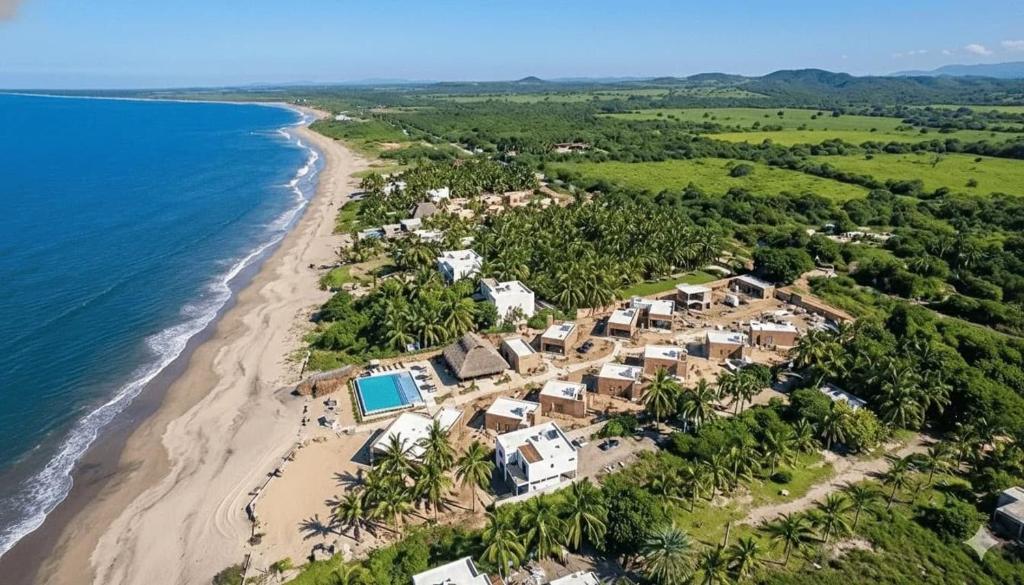an aerial view of the resort and the beach at Hotel Calma Celesti in Perihuete