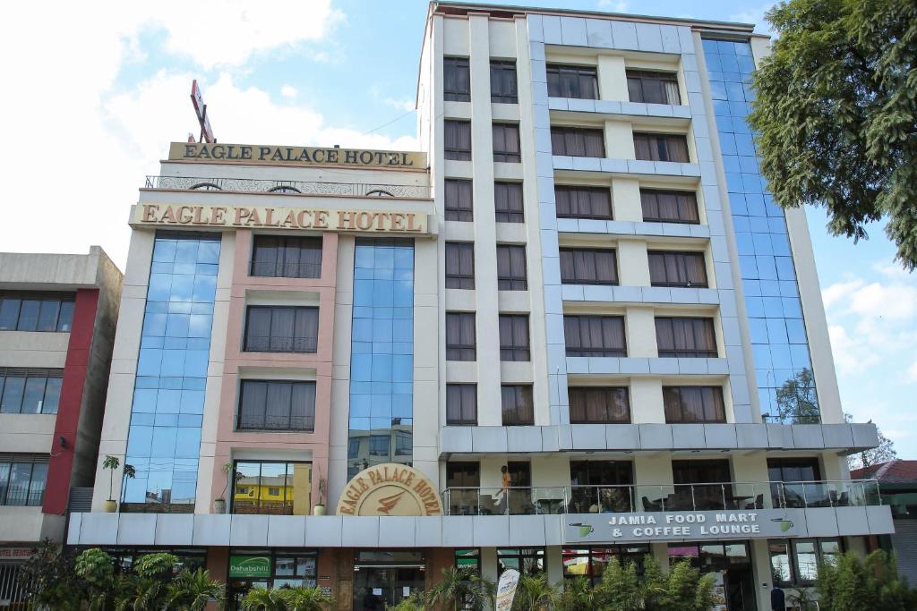 a building with a sign that reads hotel palace hotel at Eagle Palace Hotel in Nakuru