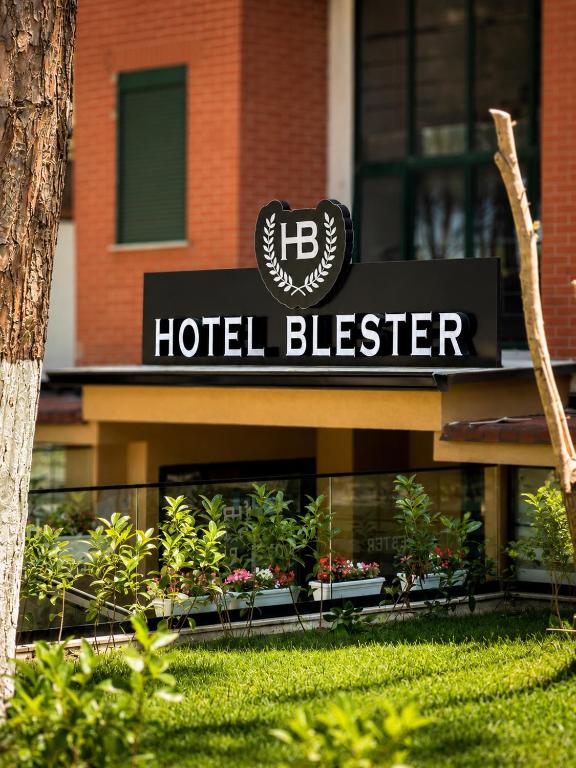 a hotel blitzer sign on the front of a building at Blester Hotel Golem Durres in Golem