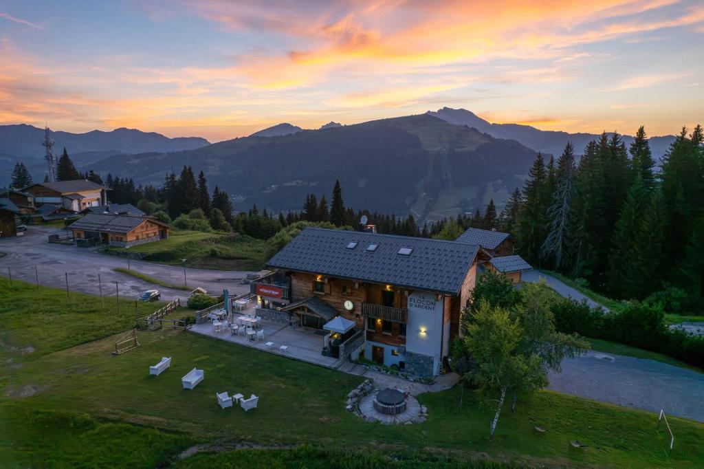 an aerial view of a house in the mountains at Le Flocon d'Argent in Les Gets