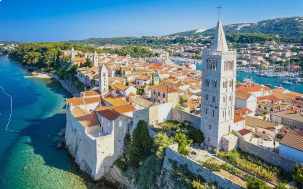 an aerial view of a city with a church at Home sweet home- Rab in Barbat na Rabu