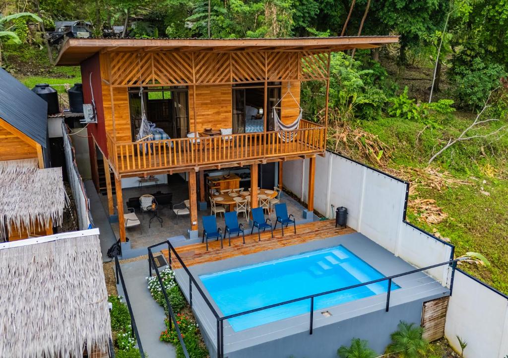 an overhead view of a house with a swimming pool at Jacaranda House, rustic, Private Pool in Talamanca