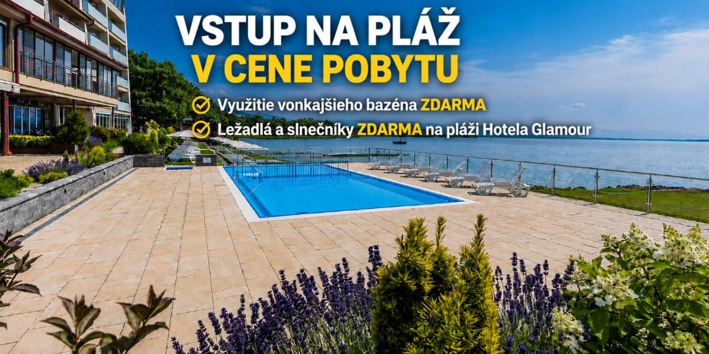 a villa with a swimming pool and a view of the ocean at Hotel Glamour in Kaluža