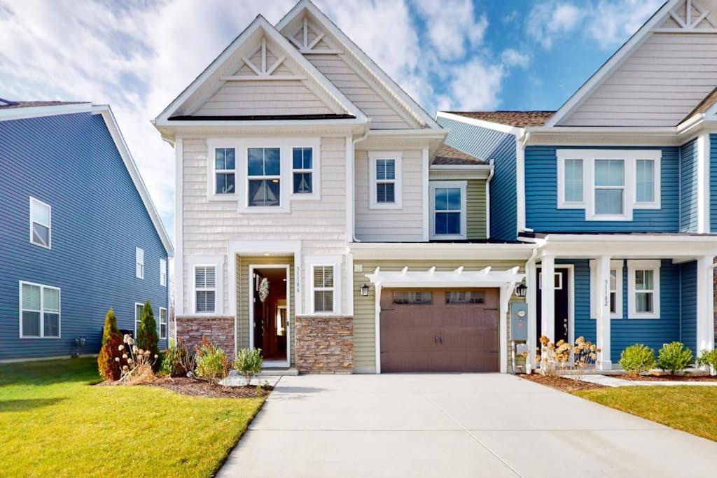 a house with a blue and white house at Bishop's Landing -- 31186 VICTOR RD in Millville