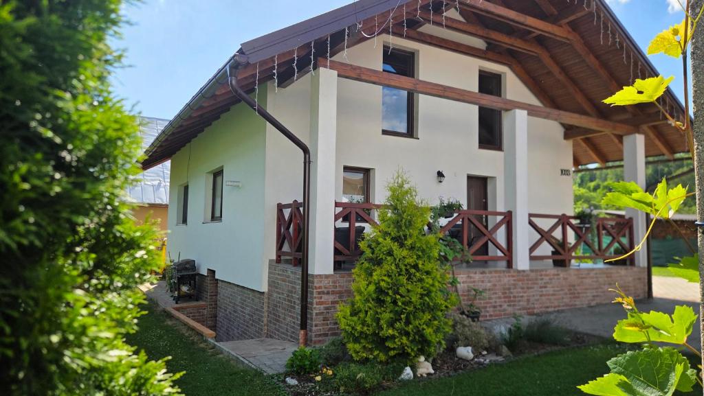 a rendering of a house with a wooden roof at Ubytovanie u Adama in Oščadnica