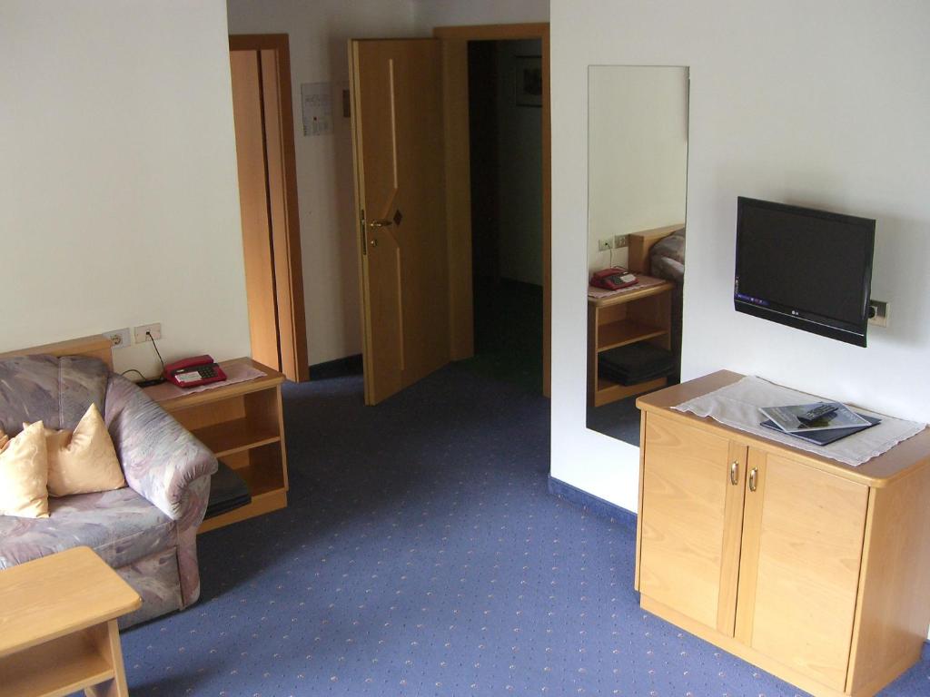 TV a/nebo společenská místnost v ubytování Residence Königsrainer