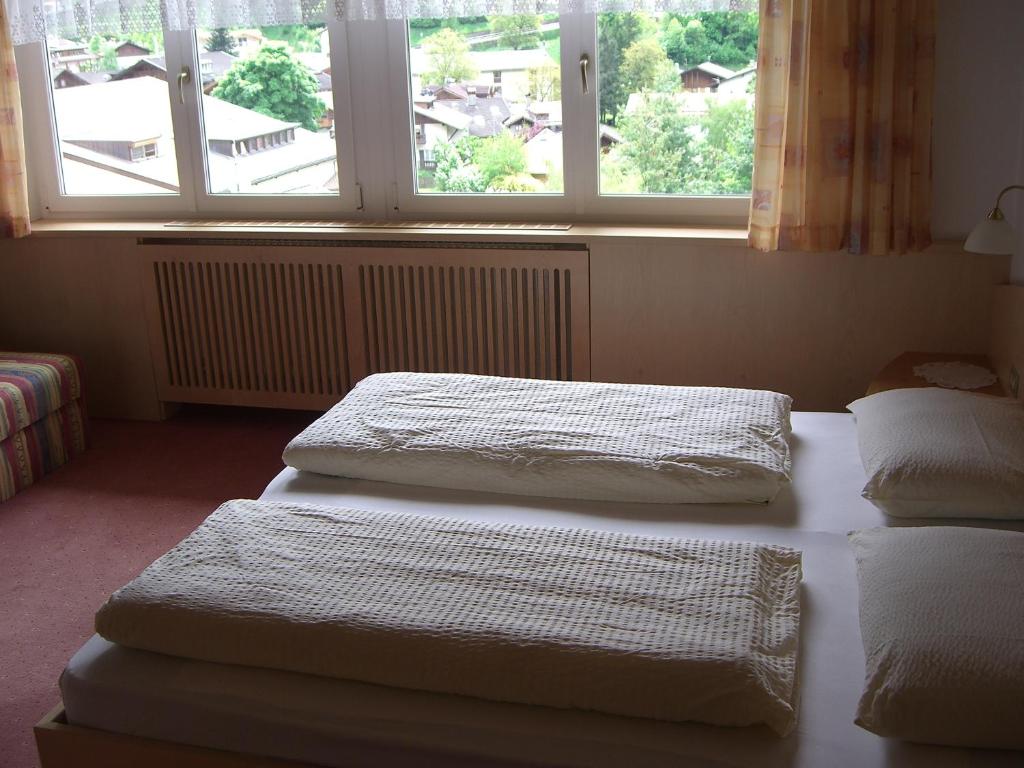 Postel nebo postele na pokoji v ubytování Residence Königsrainer