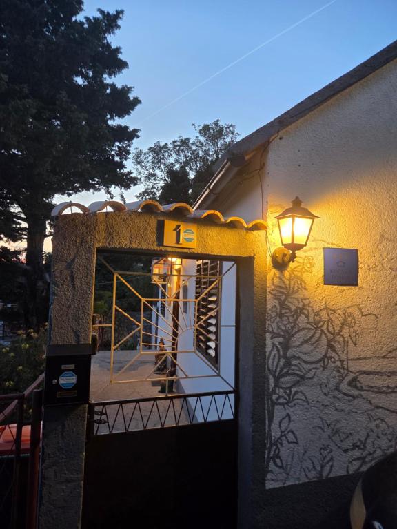 a building with a door with a light on it at Casa Maja in Karlobag