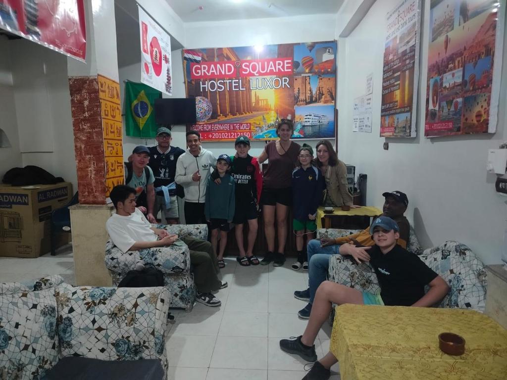 a group of people sitting in a room at Grand Backpackers Hostel Luxor in Luxor