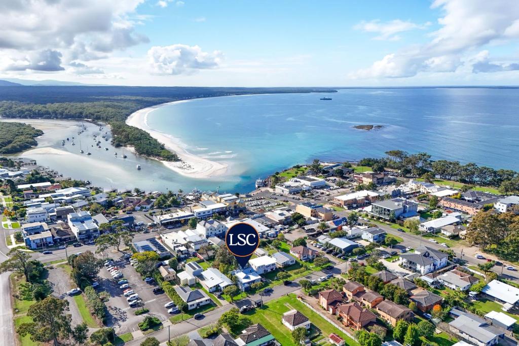 an aerial view of a city and the beach at Captains Cottage - Huskisson - Pet Friendly in Huskisson