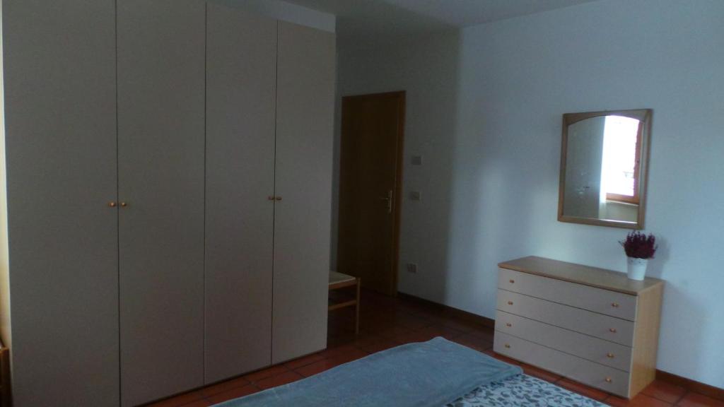 Postel nebo postele na pokoji v ubytování Appartamenti Al Ploz