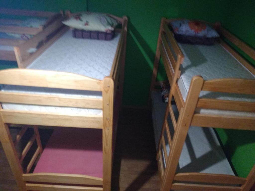 Postel nebo postele na pokoji v ubytování Yourhostel Saperka