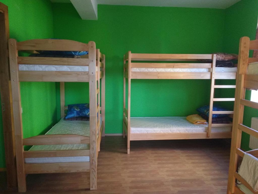 Postel nebo postele na pokoji v ubytování Yourhostel Saperka