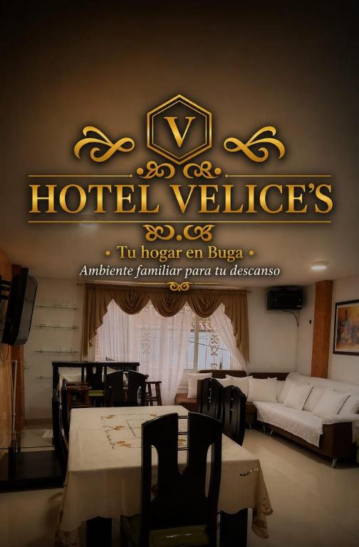 a hotel room with a hotelclusive sign on the wall at Hotel Velices in Buga
