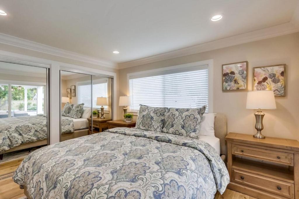 a bedroom with a bed and a window at Gorgeous Upgraded 5 Bedroom & 4 Bath Home with Jacuzzi in Orange