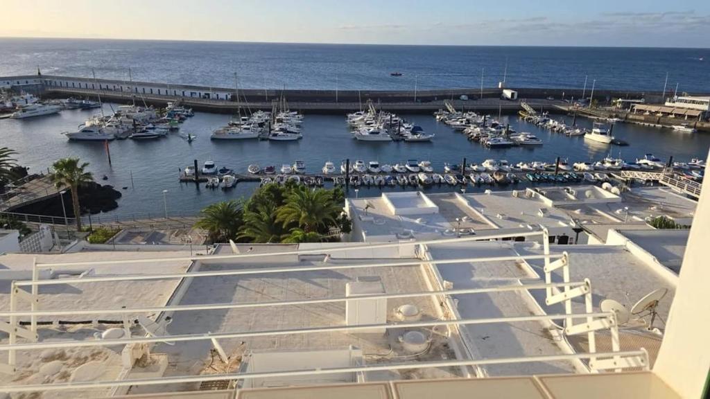 a view of a marina with boats in the water at Casa Memela 6 in Tías