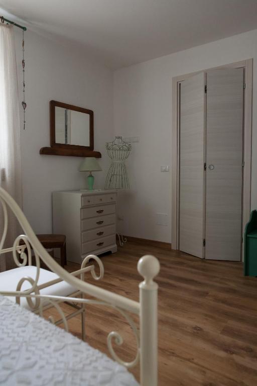 Postel nebo postele na pokoji v ubytování Agriturismo Scribano