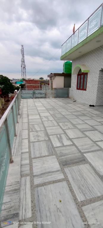a roof of a building with a tile floor at Rawat Homestay in Rishīkesh