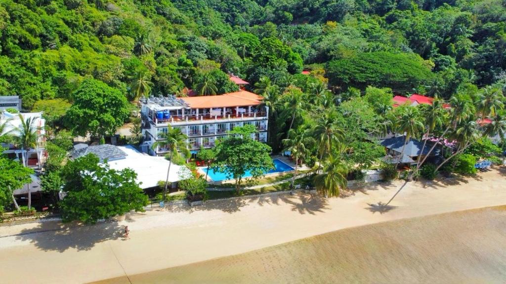 an aerial view of a resort on the beach at Doublegem Beach Resort and Hotel in El Nido