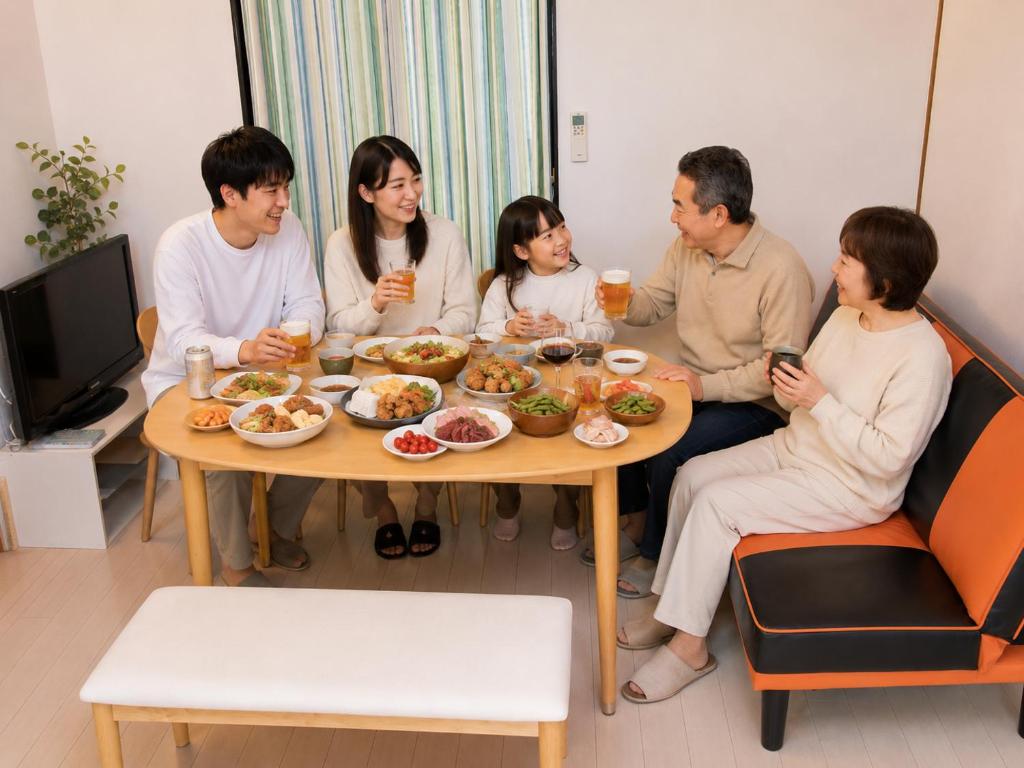 a group of people sitting around a table eating food at 宿のきむら2 in Utsunomiya