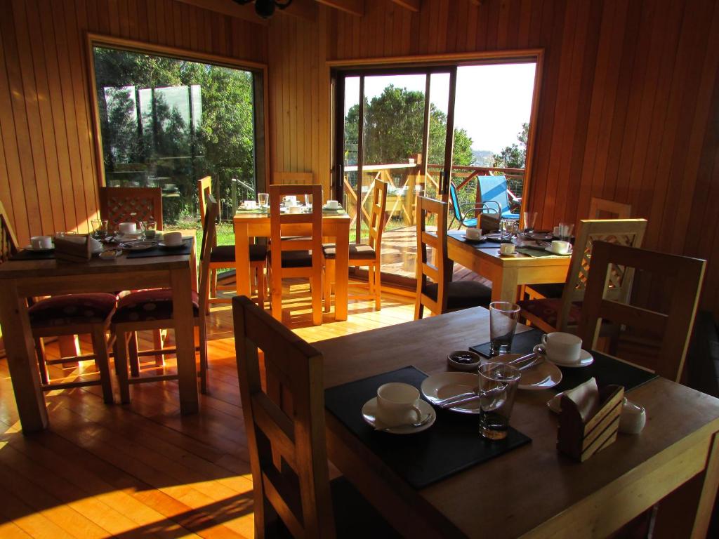 Restoran või mõni muu söögikoht majutusasutuses Lodge Cumbres de Chiloe