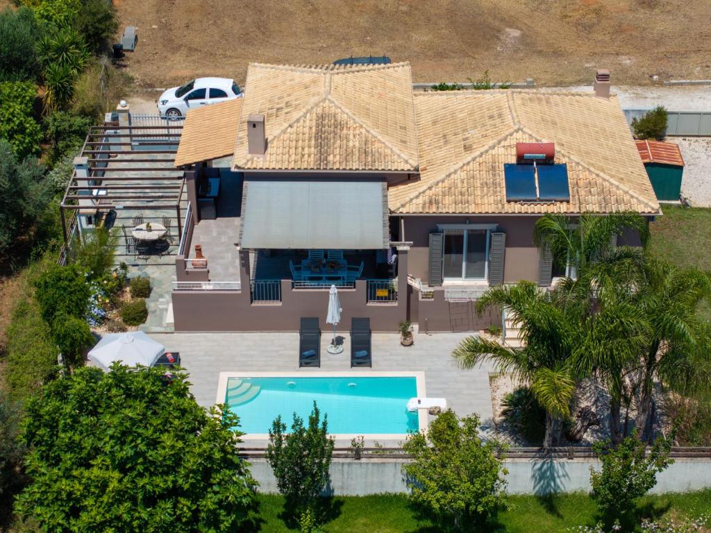 an aerial view of a house with a swimming pool at Villa Malenia in Argostoli