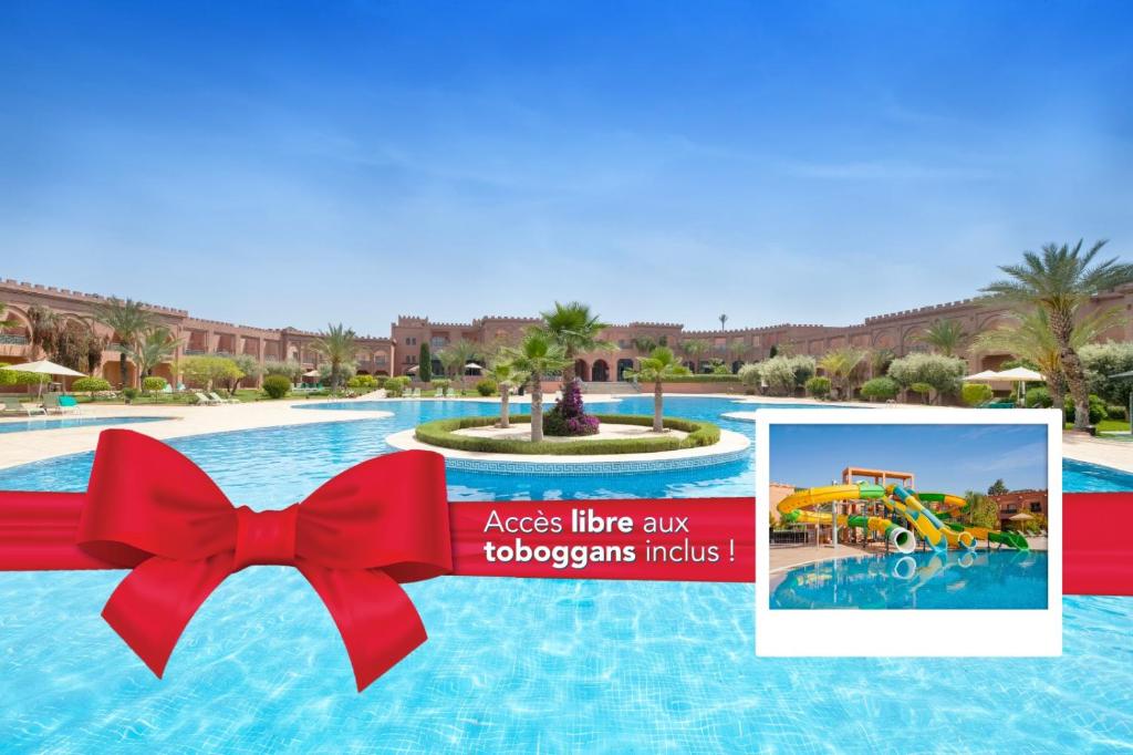 a picture of a water park with a red bow at Grand Mogador Agdal & Spa in Marrakesh