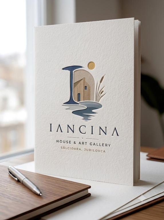 a book design for a house and art gallery at Iancina House & Art Gallery in Salcioara