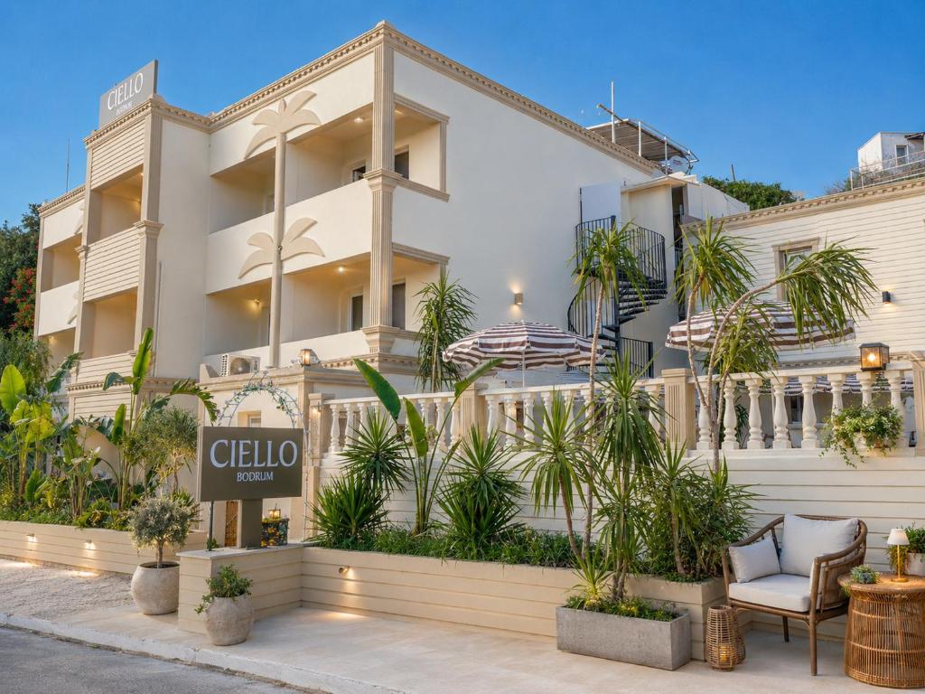 a building with a sign in front of it at Ciello Hotel Bodrum Adults Only 14 in Bodrum City