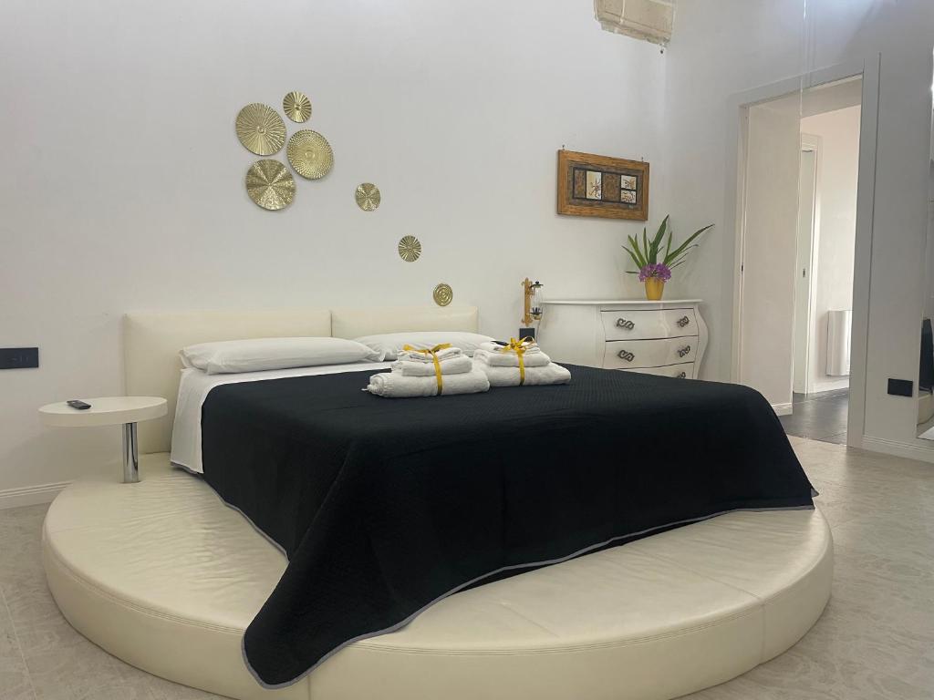 Llit o llits en una habitació de Himeros Suite