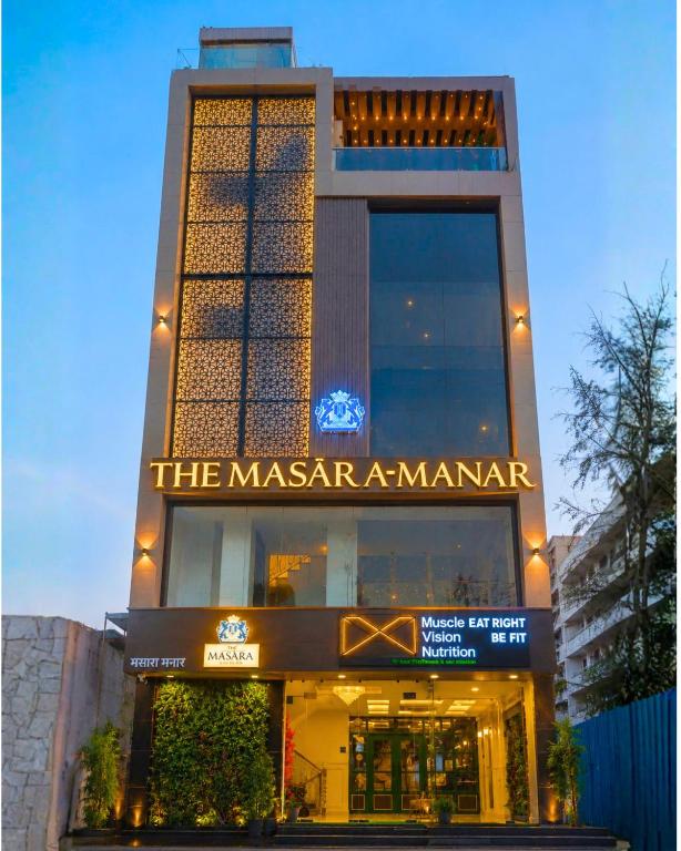 a building with a sign that reads the masaraarmaarma at THE MASARA MANAR Hotel in Gwalior