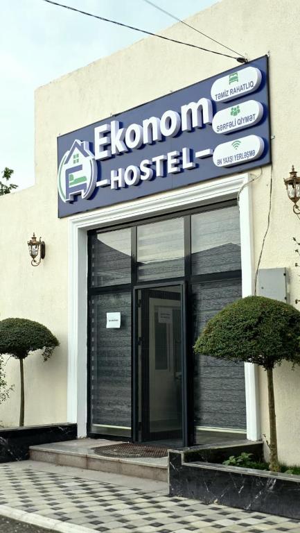 a zenon hospital sign in front of a building at Econom Hostel Ganja in Ganja