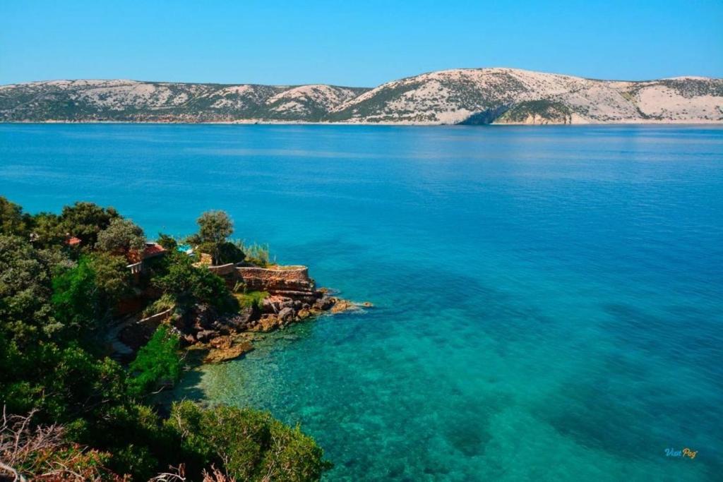 an aerial view of a large body of water at Beachside Apartments Novalja in Stara Novalja