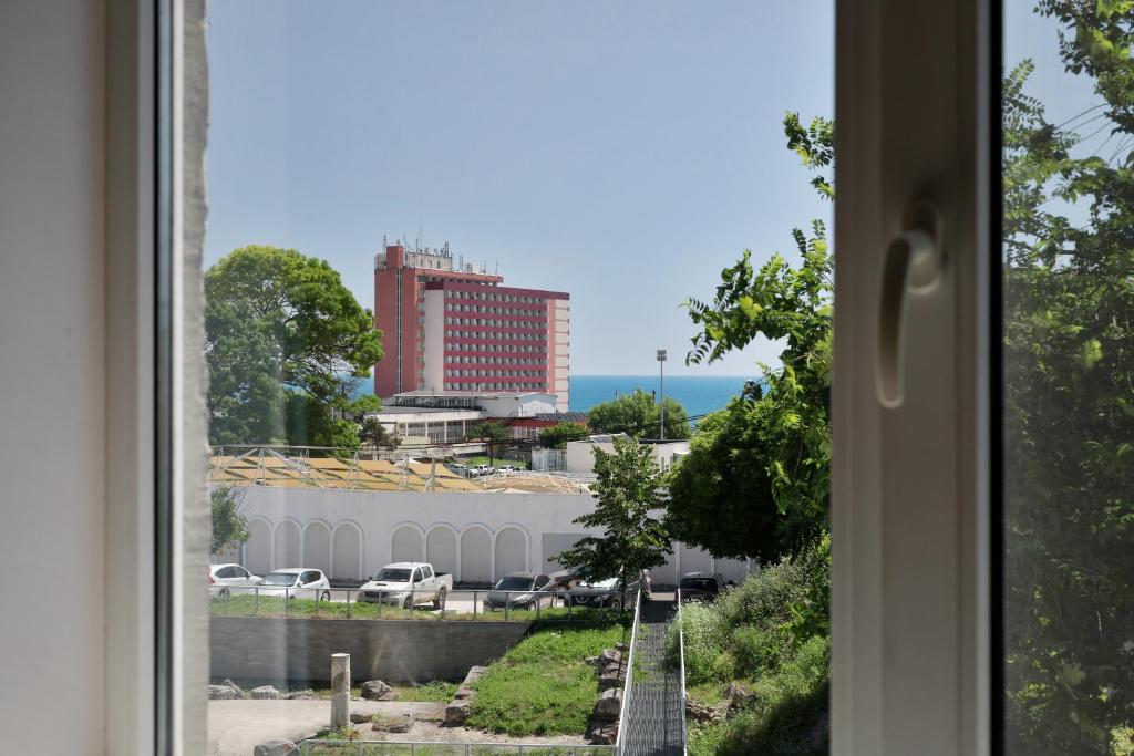 a view of a city from a window at Centralsquad in Mangalia