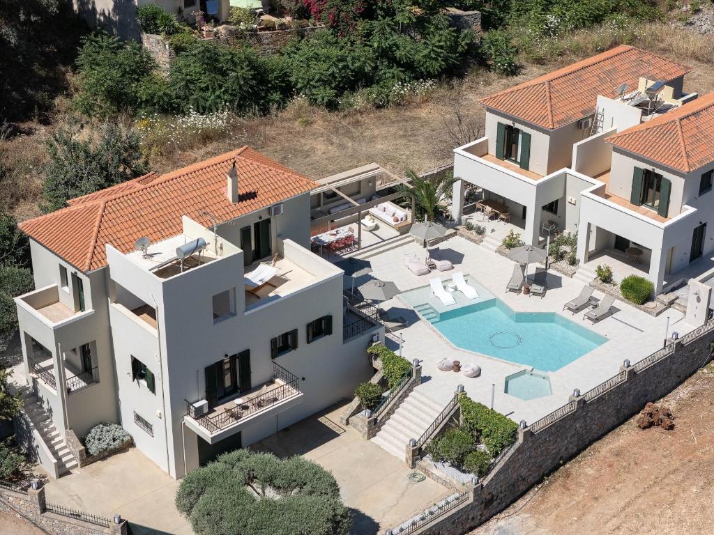 an aerial view of a house with a swimming pool at Argyro Villa in Bali